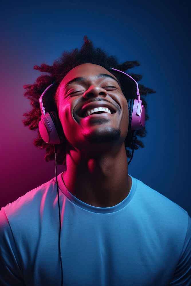 Download-premium-image-of-Happy-young-man-headphones-headset-adult_-by-Tanasiri-about-face-light-person-neon-and-men-13067768_11zon.jpg